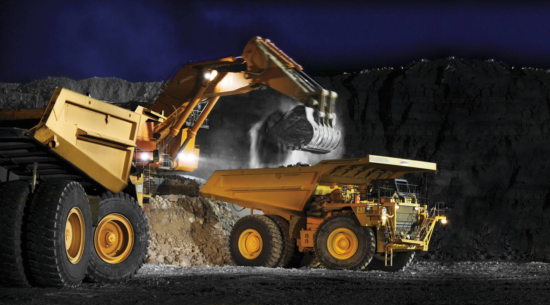 Caterpillar excavators working at mining site